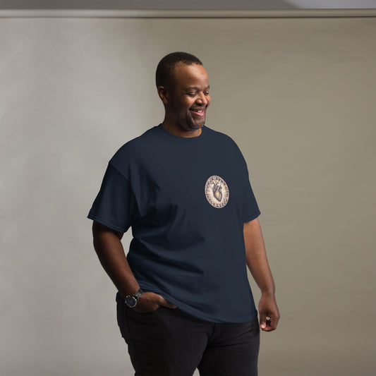 Black male model wearing a navy Heart graphic T-shirt with an anatomical heart emblem