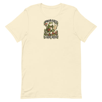 Front view of a natural-colored t-shirt with a frog explorer and the words Probably a Side Quest.