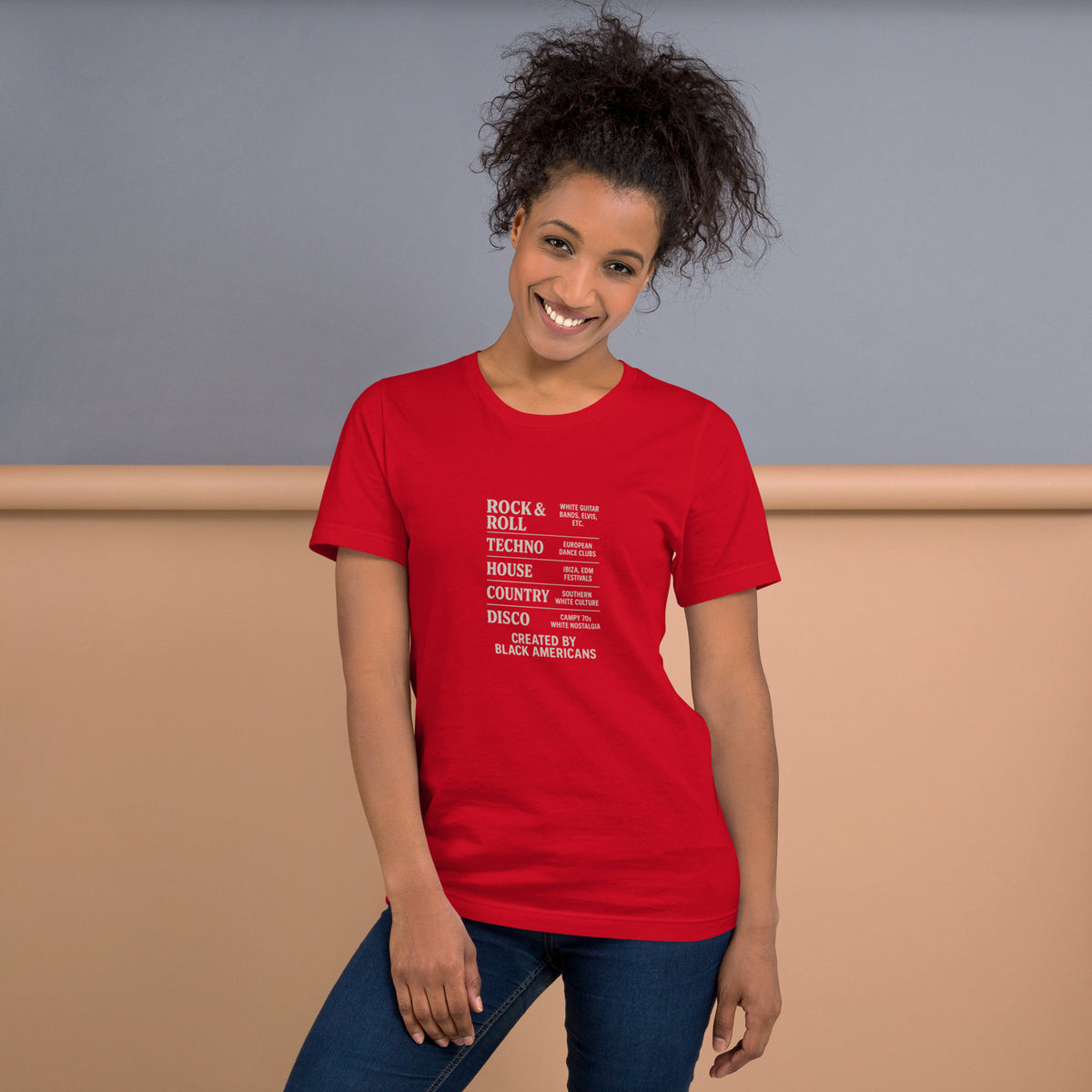Model wearing the red Black Music Genres graphic T-shirt, front view.